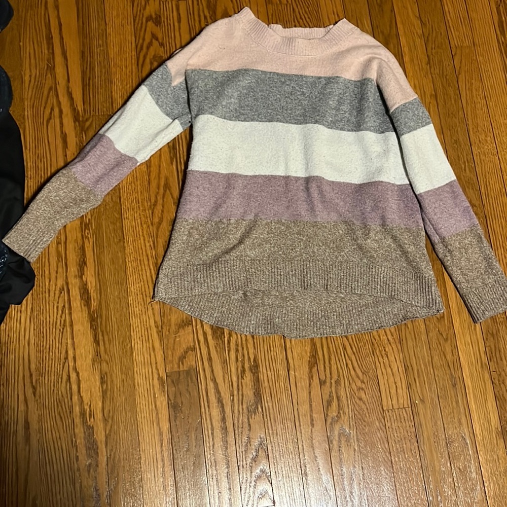 Multi-colored sweater slightly used, still in good condition though